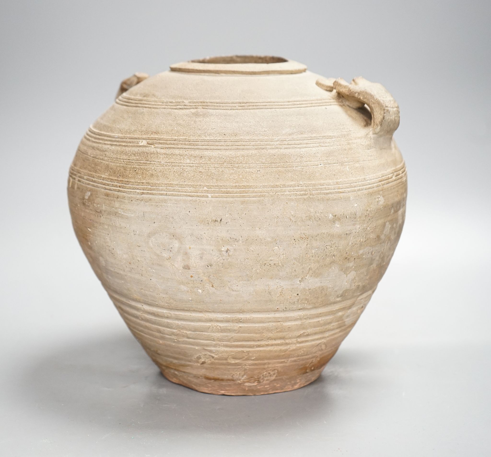 A Chinese Warring States pottery jar, 24cm